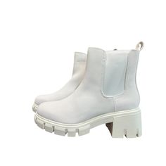 Elevate Your Boot Game With These Stylish Mia N7947 Platform Chelsea Boots. These White Boots Feature A Solid Pattern And Are Made With Synthetic Upper Material. The Mid-Height Heel Measures Between 2-2.9 Inches, Providing A Comfortable Fit For All-Day Wear. These Boots Are Perfect For Any Woman Looking To Add A Touch Of Sophistication To Their Wardrobe. The Chelsea Style Makes Them Easy To Slip On And Off, While The Platform Sole Adds A Trendy Touch. Available In Size 7, These Boots Are Sure To Casual High Heel Martin Boots In Synthetic Material, Casual High Heel Martin Boots In Synthetic, Casual High Heel Synthetic Martin Boots, Casual Chunky Platform Heeled Boots, Casual Chelsea Boots With Chunky Platform, Casual Chunky Platform Ankle Boots, Casual Ankle Boots With Chunky Platform, Casual Synthetic Ankle Boots, Casual Platform Chelsea Boots