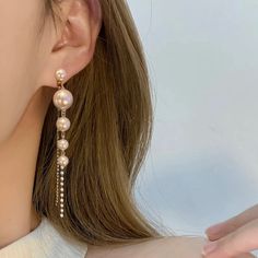 These Elegant And Sophisticated Big Gold Filled Simulation Pearl Long Drop Earrings. Style Them For Daytime, Wear Them At Night Or Dress Them Up For A Fancy Affair. Material : 100% 925 Sterling Silver + White Simulated-Pearl Measurements : Studs Measure 6.5 C (8.50 Cm Long For Diamonds And Small Pearls Chains) Shape: Long Drop Earrings Weight: 0.33 Oz Most Merchandise Ships Within 2 Days All Items Come Packaged In A Small Jewelry Box Which Is For When Buying As A Gift. Feminine Dangle Pearl Earrings For Party, Rose Gold Dangle Pearl Earrings For Party, Rose Gold Dangle Pearl Party Earrings, Pearls Chains, Small Jewelry Box, Long Drop Earrings, Pearl Chain, Small Jewelry, At Night