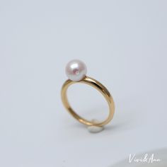 With a delicate classic design of solid gold and pearl, complete your jewelry box with a piece of real fine jewelry but affordable price. Hand picked flawless 7-7.5mm premier round Akoya cultured pearl with gorgeous hues. We only use the best Akoya for fine jewelry series. Available in solid 14K white, yellow and rose gold. - 7-7.5mm Premier Akoya Cultured Pearl- Solid 18K Gold Available in Rose, Yellow or White*Please note:This is a Made To Order ring, and will be handcrafted to order and ship Fine Jewelry Yellow Gold Pearl Ring With High Luster, Classic Gold Pearl Ring With Polished Finish, Yellow Gold Pearl Ring With High Luster, Classic Round Pearl Ring With Pearl Drop, Classic Pearl Ring With Pearl Drop, Formal 14k Gold Pearl Ring With High Luster, Formal Yellow Gold Pearl Ring With High Luster, Formal High Luster Yellow Gold Pearl Ring, Classic Gold Pearl Ring With High Luster