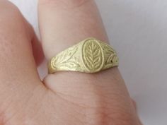 Unique handwork broze ring from Macedonia of 1800s, which came in rarely good condition. The ring is hand carved with beautiful floral ornament. It has size 10 (the US size) or 20 mm diameter - more like large women size or men size. Thevring had a strong patina, ehich I mostly cleaned (left some inside of the ring). Also you can see a sign of metal checking, made by somebody - from inside of the ring. This is not visible, when the ring is on finger. Rare and beautiful gift from old Balkans. Ceremonial Antique Rings With Antique Finish, Antique Hand-cast Signet Ring For Gift, Antique Hand Cast Signet Ring For Gift, Traditional Yellow Gold Signet Ring For Ceremonial Use, Traditional Yellow Gold Ceremonial Signet Ring, Traditional Yellow Gold Signet Ring For Ceremonial Occasion, Antique Engraved Ring With Antique Finish As Gift, Antique Engraved Ring As Gift With Antique Finish, Antique Bronze Hand Cast Ring