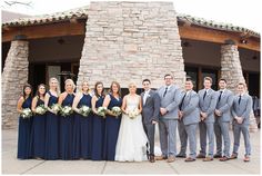 a bride and groom with their bridal party