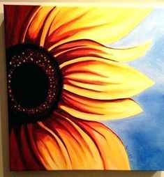 a painting of a sunflower on a wall