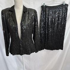 Lillie Rubin Black Sequin 100% Silk Jacket Skirt Suit Vintage 1990s Medium Set Jacket Has A Button Closure Skirt Waist Elastic Is Little Stretched And Might Need To Be Replaced Jacket Underarm To Underarm 18 Inches Jacket Length 27 Inches Skirt Waist 34 Inches Skirt Length 29 Inches Black Skirt Suit For Fall Party, Black Skirt Suit For Party In Fall, Fall Party Skirt Suit, Winter Party Long Sleeve Skirt Suit, Long Sleeve Skirt Suit For Fall Parties, Black Long Sleeve Skirt Suit For Evening, Black Long Sleeve Skirt Suit For Party, Fitted Skirt Suit For Night Out In Fall, Black Fitted Skirt Suit For Night Out