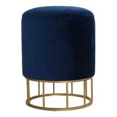 a blue velvet stool with gold metal frame and round foot rest on an isolated white background