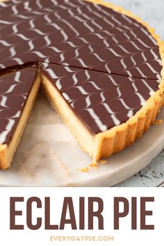 a chocolate tart pie with the words eclair pie on top and bottom