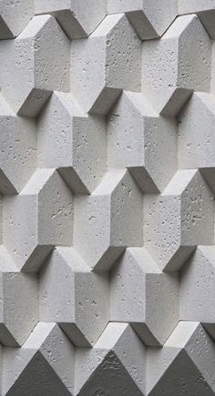 an abstract wall made up of concrete blocks