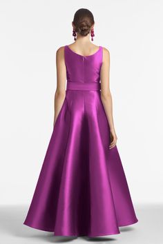 Kruse is our classic scoop neck ball gown in magenta. Princess seams on the bodice and skirt for a tailored fit. There is no doubt this is one of our most elegant silhouettes that will never go out of style. Details:Model is 5'10" Wearing A Size 2Full-Length, 60" from top of shoulder to bottom hemBack ZipperSingle Face Mikado85% Polyester - 15% SilkImportedStyle #S231G30-677 Magenta Gown Prom, Magenta Dress Satin, Magenta Anarkali, Evening Taffeta Maxi-length Gown, Magenta Couture Gown, Navy Wedding, Indian Fashion Dresses, Evening Gowns Formal, Princess Seam