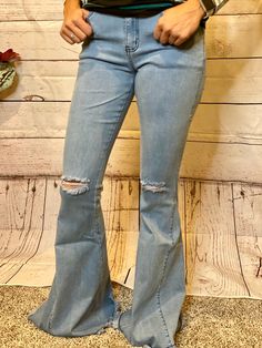 Denim Flares With Five Pockets, Mid-rise Distressed Medium Wash Flare Jeans, Trendy Fitted Distressed Flares, Dark Wash Flare Denim Jeans, Dark Wash Denim Flare Jeans, Denim Flare Jeans With Frayed Hem For Fall, Medium Wash Mid-rise Flares With Five Pockets, Distressed Flare Denim Jeans, Distressed Denim Flare Jeans