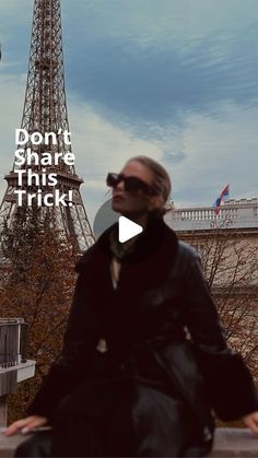 a woman standing in front of the eiffel tower with text don't share this trick