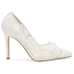 These classic flower wedding shoes are encased in elegant lacework that trails from toe to heel. The straight lines create a strong profile, balanced with the elegantly looping lace pattern. Everything is topped off with a petite bow made of ivory picot ribbon. Create a new wedding heirloom with Sophia ivory lace heels wedding wear for brides. Handmade, extra padding for all-day comfort Reviews say fit true to size Heel height: 4 in / 10.1 cm Color: Ivory Material: Lace, silk, and mesh upper; le Elegant Off White Round Toe Heels, Luxury White Wedding Shoes With Padded Heel, Off White Elegant Heels For Evening, Elegant Off White Evening Heels, Elegant White Heels With Reinforced Heel, Elegant Off White Heels For Formal Occasions, Cream Pointed Toe Wedding Shoes With Removable Insole, Luxury Low Heel Cream Heels, Luxury Cream Low Heel Heels