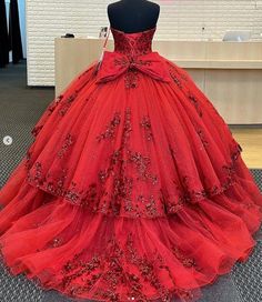 Red Tulle Quinceanera Dress For Debutante Ball, Red Sweetheart Neckline Ball Gown For Pageant, Embellished Strapless Ball Gown For Quinceanera, Embellished Ball Gown For Sweet 16, Embellished Ball Gown With Sweetheart Neckline For Sweet 16, Embellished Sweetheart Neckline Ball Gown For Sweet 16, Sweetheart Neckline Embellished Ball Gown For Sweet 16, Sweet 16 Embellished Ball Gown, Sleeveless Quinceanera Dress With Fitted Bodice For Debutante Ball