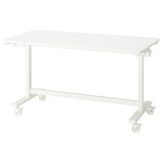 a white table with wheels on it