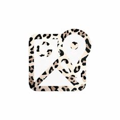 an animal print square with the letter q in it's center, on a white background