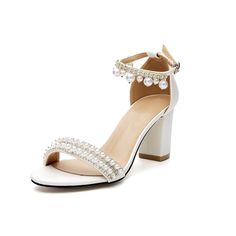 a women's white high heeled sandal with pearls