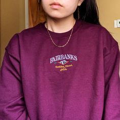 "*SIZES ARE UNISEX* -For women, I'd suggest your usual size for a regular fit (size up for a more relaxed fit). Men should size up for a more relaxed fit. *these sweatshirts are extra comfy when oversized ⛰ \"Fairbanks Golden Heart of Alaska\" embroidered with on a comfy cute vintage-style crewneck. A sturdy and warm sweatshirt bound to keep you warm in the colder months. A pre-shrunk, classic fit sweater that's made with air-jet spun yarn for a soft feel and reduced pilling. Your new favorite s Casual Fall Sweater With Embroidered Logo, Fall Campus Tops With Embroidered Graphics, Retro Embroidered Sweatshirt For Fall, College Crew Neck Sweater With Embroidered Graphics, Winter Crew Neck Sweater For Campus, Oversized Fall Sweater With Embroidered Logo, Oversized Sweater With Embroidered Logo For Fall, Crew Neck Sweater For Campus In Winter, Trendy Embroidered Logo Sweater For Fall