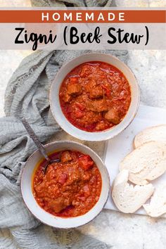 two bowls filled with red sauce next to bread