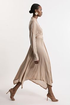 Feel Elevated In Our Midi Dress, Made With Jersey Fabric, Featuring An Ultra Relaxed Fit, A Plunge Neckline, Wide, Long Sleeves, And A Belted Waistline. The Waterfall Hemline Creates Enticing Movement, And Photographs Beautifully. Style It With Court Heels Or Sandals For A Look That Will Take You From Dinner Dates To Dressy Days Out. Premium Tencel Jersey Waterfall Hem Midi Dress High Quality Jersey Fabric Ultra Relaxed Fit Plunging V Neckline Flowing, Waterfall Skirt Belted Waistline Formal Col Bride Jumpsuit, Petite Wedding Guest Dresses, Waterfall Skirt, Tencel Dress, Transitional Fashion, Summer Bridesmaid Dresses, Winter Wedding Guest Dress, Spring Wedding Guest Dress, Honeymoon Outfits