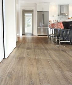 the kitchen is clean and ready to be used as a dining room or family room