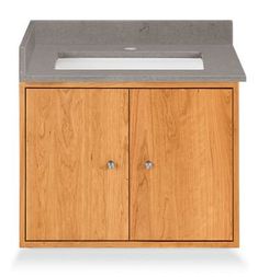 a wooden cabinet with two doors and a sink in the top section, on a white background