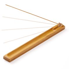 a wooden stick with several sticks sticking out of it