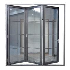 an open glass door on the side of a building