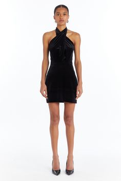 Add some drama to your evening in the Mezcal Dress, your go-to little black dress. The crossover halter detail adds a bold, sculptural element to this sleek silhouette. With statement earrings and black heels, you’ll feel as amazing as you look. Ideal for flirty dates, club nights, or evening soirées. Perfect for: Flirty dates, club nights, rooftop bars, evening soirées.  Style Details: Dress  Mini  Crossover Halter  Invisible Zipper  Self: 93% Polyester 7% Spandex Lining: 100% Polyester  Dry Clean Only  VE-21365 Mini Crossover, Rooftop Bars, Amanda Uprichard, Exclusive Dress, Maxi Gowns, Dress Mini, Shop Maxi Dresses, Invisible Zipper, Black Heels