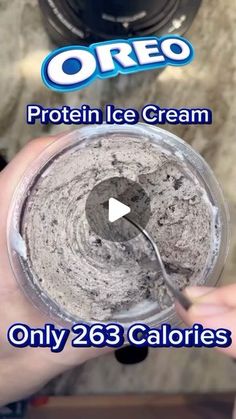 someone is holding up a container with ice cream in it and the caption reads, only 28 calories