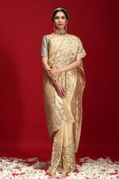 Golden saree highlighted with geometric mirror motif embroidery. Comes with blouse.
Component: 2
Embroidered
Sleeve Length: Short Sleeves
Fabric: Tissue
Color: Gold
 - Aza Fashions Golden Saree, Geometric Mirror, Motif Embroidery, Embroidered Saree, Gold Blouse, Blouse For Women, Fashion App, Buy Gold, Saree With Blouse