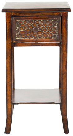 an old wooden table with carvings on the top and bottom shelf, isolated against a white background