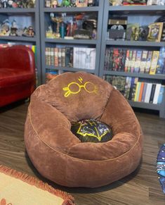 a harry potter bean bag chair in front of a bookshelf