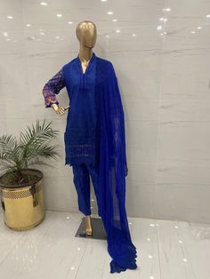 Fabric:   lawn   3 pc shirt trouser dupatta  Shirt: Embroidered chicken kari  shirt  beautifully embroidered chicken kari daman printed embellished sleeves , printed  back  embroidered  chiffon duptta  Plain trouser Measurement  🧵  medium 👗  Shoulder: 15  Chest: 40 Waist: 46 Sleeves length: 18 Shirt length: 38  Aramhole: 9.5  Trouser length: 37  Large 👗  Shoulder: 15  Chest: 46  Waist: 49 Sleeves length: 19 Shirt length: 40  Aramhole: 10.5  Trouser length:  37 Festive Lawn Suit With Naqshi In Cambric, Designer Nida Lawn Suit With Dabka, Festive Cambric Lawn Suit With Naqshi, Anarkali Churidar With Naqshi In Mulmul, Cotton Lawn Suit With Dabka For Eid, Unstitched Shantoon Lawn Suit For Festive Occasions, Unstitched Festive Lawn Suit With Naqshi, Blue Jamawar Lawn Suit With Resham Embroidery, Eid Cotton Lawn Suit With Naqshi Embroidery