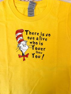 To pay homage and participate in Dr. Seuss week at school or birthday theme. Sizes available: pre-school sizes 2T-5T kids youth size XS-XL Can also do adult sizes Indicate size in notes Dr Seuss Outfit, Dr Seuss Week, Paul Frank, T Shirt Photo, Pre School, Embroidered Tshirt, Kids T Shirts, Dr Seuss, At School