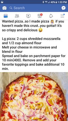 a pizza sitting on top of a pan covered in toppings