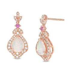 Create a beautiful look with these elegant drop earrings. Fashioned in sterling silver and 14K rose gold plate, each earring showcases a 7.0 x 5.0mm pear-shaped lab-created iridescent opal cabochon centered in a flower-shaped frame adorned with lab-created shimmering white sapphires. Duos of additional created sapphires grace a leaf trio positioned above a lab-created bright pink sapphire. Buffed to a brilliant luster, these post earrings secure comfortably with friction backs. Exquisite Rose Gold Drop Earrings, Elegant Pink Sterling Silver Teardrop Earrings, Elegant Hallmarked Chandelier Earrings, Pink Gold Sterling Silver Earrings For Anniversary, Pink Gold Sterling Silver Fine Earrings, Pink Gold Sterling Silver Earrings Fine Jewelry, Rose Gold Chandelier Earrings For Anniversary, Elegant Rose Gold Earrings In Fine Jewelry Style, Formal Rose Gold Sterling Silver Bridal Earrings