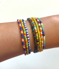 Colorful seed bead bracelets sold in packs 3, of various patterns in colors you choose! Bracelets are stretchy and stackable. Cheap Multicolor Bracelets With Tiny Beads, Multicolor Beaded Friendship Wrap Bracelet, Multicolor Beaded Wrap Bracelet For Friendship, Multicolor Round Beads Wrap Bracelet For Friendship, Trendy Multicolor Heishi Beads Bracelets, Trendy Multicolor Heishi Beads Bracelet, Multicolor Tiny Beads Wrap Bracelet For Friendship, Multicolor Tiny Beads Bracelet For Summer, Trendy Multicolor Friendship Bracelets With Tiny Beads