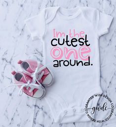 Cute Cotton Onesie For Birthday, Cotton Cute Onesie For Birthday, Pink Onesie With Letter Print For First Birthday, Pink Letter Print Onesie For Gender Reveal, Cute Short Sleeve Onesie For First Birthday, Cute Pink Onesie For Gender Reveal, Playful Onesie With Name Print For First Birthday, Pink Short Sleeve Onesie For Gender Reveal, Cute White Onesie For Birthday