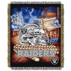 the oakland football team tapestry thrower with an image of a helmet and lightning in the background