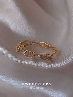 Product Details + Care  - 18K Gold Dipped Over Brass - Brass: Copper + Zinc Alloy - 1 Ring - Wipe Clean  - Imported  Dimensions - Size is 6 Have a question? Please message info@shopsweetpeeps.com and our support team will get back to you in 48 hours. Cute Promise Rings, Proposal Rings, Pretty Engagement Rings, Pretty Jewelry Necklaces, Elegant Jewellery, Cute Engagement Rings, Band Art, Rings Collection, Blue Ring