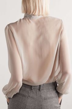 Elegant Sheer Tops For Workwear, Elegant Silk Tie Neck Top, Elegant Tie Neck Blouse For Daywear, Elegant Office Tops With Sheer Sleeves, Elegant Office Top With Sheer Sleeves, Sheer Silk Office Blouse, Classic Sheer Blouse For Office, Designer Silk Blouse With Tie Neck, Luxury Silk Blouse For Office