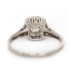 VIEW A VIDEO OF THIS RING https://youtu.be/xwMvlV8mqg4 Description: This antique gem is a 1910s Edwardian style Platinum engagement ring with a 1.62ct Old European Brilliant cut center diamond! Exquisite filigree designs run along the entire shank leading up to the tall setting and where the center diamonds sits. Held by 4 prongs, this diamond sits securely and has amazing clarity and glistens in the light! This is a true antique piece, and we are honored to offer it to our Etsy family. This rin Vintage White Emerald Cut Ring, White Gold Cushion Cut Ring With Rose Cut Diamonds, Vintage White Asscher Cut Rings, Vintage Platinum Cushion Cut Ring, Antique Gia Certified Diamond Ring Gift, Vintage Asscher Cut Diamond White Ring, Vintage Cushion Cut Platinum Ring, Antique Cushion Cut Anniversary Rings, Art Deco Diamond Cushion Cut Ring