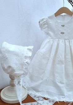 Rococo linen White dress Baptism / Birthday / Wedding formal outfit Couture elegant embroidery lace Made in Greece ♥ DESCRIPTION Outfit set contains : dress headband hat (optional) - assorted with the dress Size options available Wrapped in elegant packaging ♥ Shoes variety to choose here : http://etsy.me/1Ozon2p Complete baptism sets here : https://etsy.me/2Otn0bh ♥ AFTER CONTACT Options Rush order help Order catholic christening gown Create the event, based on the color, environment, theme , s Elegant First Communion Dress For Summer, Elegant First Communion Dress For Summer Confirmation, Elegant Summer First Communion Dress, Elegant Cream Baptism Dress For Summer, Elegant Fitted First Communion Dress, Elegant White First Communion Dress For Summer, Elegant White First Communion Summer Dress, Elegant White First Communion Dress, Elegant Summer Baptism Dress With Ruffles