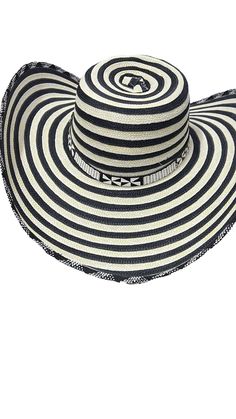 Sombrero Colombiano Vueltiao Costeño Hat Discover the Charm of Colombian Tradition with the Sombrero Costeño! Bring a touch of Colombia to your wardrobe with the authentic Sombrero Costeño. This iconic hat, crafted by skilled artisans, embodies the rich cultural heritage and vibrant spirit of Colombia's coastal regions. Features: Handcrafted Excellence: Each Sombrero Costeño is meticulously handmade using traditional techniques passed down through generations. Natural Materials: Made from high-q Black Wide Brim Hat For Cinco De Mayo, Traditional Wide Brim Hat For Cinco De Mayo, Traditional Hat For Beach And Cinco De Mayo, Traditional Curved Brim Hat For Cinco De Mayo, Colombian Culture, Hispanic Culture, Kids Onesies, Traditional Techniques, Cultural Heritage