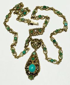 VERY beautiful, substantial and rare authentic Vintage Austro Hungarian sterling silver gold gilt Turquoise, enamel and pearls necklace! please see photos as part of description. it is in great vintage condition - in great clean condition and can be worn/gifted immediately- comes in a gift box. it is probably was not worn much because the gold gilt all present and the enamel in very very good condition! tested to be approx 800-925 silver with yellow gold gilt over. smoke free environment! fast s Ornate Turquoise Jewelry For Collectors, Victorian Jeweled Pendant Necklace, Antique Hallmarked Turquoise Jewelry, Victorian Hallmarked Turquoise Jewelry, Victorian Turquoise Hallmarked Jewelry, Victorian Turquoise Jewelry For Formal Occasions, Antique Jeweled Collectible Necklace, Victorian Turquoise Pendant Jewelry, Vintage Turquoise Filigree Necklace