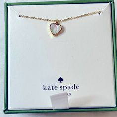 White Colored Stone, Yellow Tone Necklace Comes With Box, Box Does Have A Cut Across The Bottom White Jewelry With Gift Box For Birthday, Kate Spade White Jewelry For Anniversary, Kate Spade Necklaces With Adjustable Chain As Gift, Kate Spade Necklace With Adjustable Chain, Kate Spade Necklace With Adjustable Chain For Gift, White Box-shaped Jewelry Gift, Kate Spade Jewelry With Adjustable Chain For Gifts, White Heart-shaped Jewelry Gift, Elegant Kate Spade Necklace Gift