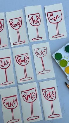 the wine glasses are drawn on paper with markers