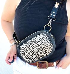 Our all leather Bum Bag is perfect for putting a little zest into your style routine! Keep your valuables safe and secure without sacrificing your fashion sense. Zip it up, buckle it down, and adjust the strap to fit you just right. Don't worry, we got you covered! Now you can bum it in style. Handcrafted in Texas 100% Leather Measurements: 8" x 5" Leather Bum Bag, Black White Hair, Toiletry Kit, Bum Bag, The Grace, Trifold Wallet, White Hair, Fashion Sense, Card Wallet