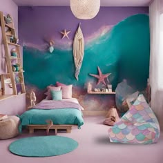 a bedroom decorated in pink, blue and green with mermaid themed decor on the walls