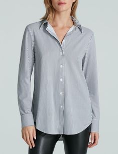 Designed with an oversized, relaxed fit and engineered from our luxe Italian microfiber. The Classic Oversized Button Down Shirt is pilling-resistant, wrinkle resistant, machine washable, and so unbelievably comfortable, you'll want to live in it (and you will). Without the gaps and popping buttons of traditional button downs thanks to its remarkable four-way stretch. Rock it in the boardroom—and at brunch. Product Details    Luxury microfiber blend (78% nylon, 22% elastane)   Fit-tested on real Oversized Button-up Blouse For Business Casual, Oversized Blouse For Business Casual, Elegant Oversized Button-up Shirt, Oversized Classic Blouse For Business Casual, Elegant Oversized Tops With Spread Collar, Oversized Classic Tops For Business Casual, Chic Oversized Blouse For Business Casual, Oversized Elegant Top For Business Casual, Elegant Oversized Business Casual Blouse