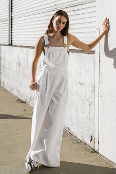 A woven overall featuring adjustable straps, center front pocket, front pleated pant, side and back pockets and wide leg. 100% Cotton Pleated Pant, Pleated Pants, Turks And Caicos, Guinea Bissau, Trinidad, Trinidad And Tobago, Brunei, Front Pocket, Fitness Models