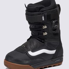 the snowboard boots are black and brown